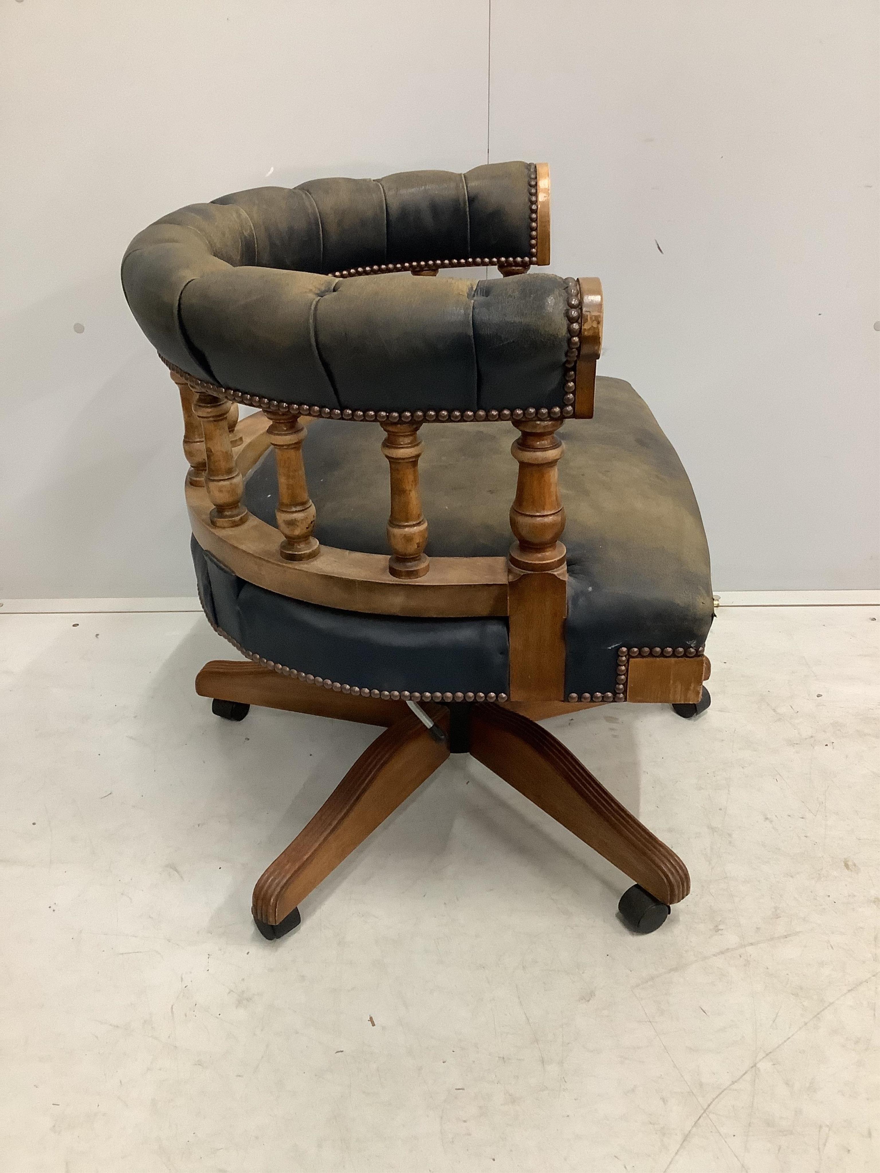 A Victorian style mahogany swivel desk chair, width 69cm, depth 57cm, height 70cm. Condition - fair